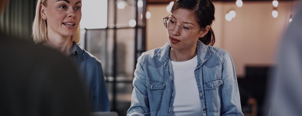 Picture of a team in a business meeting in an office