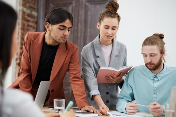 Picture of a team in a business meeting in an office