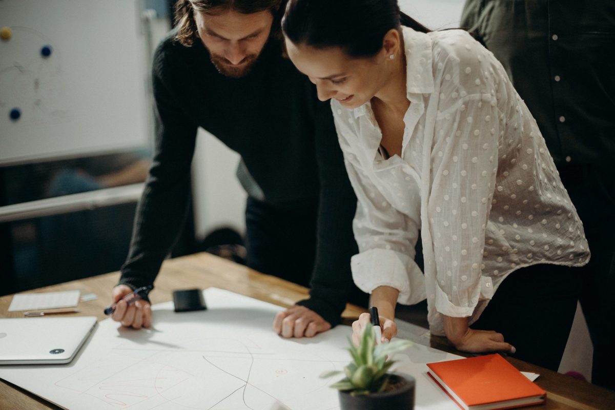 A team creating designing on a table in an office